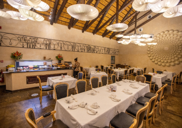 Photo of table set up at The Senchi Restaurant at The Royal Senchi Hotel & Resort in Ghana