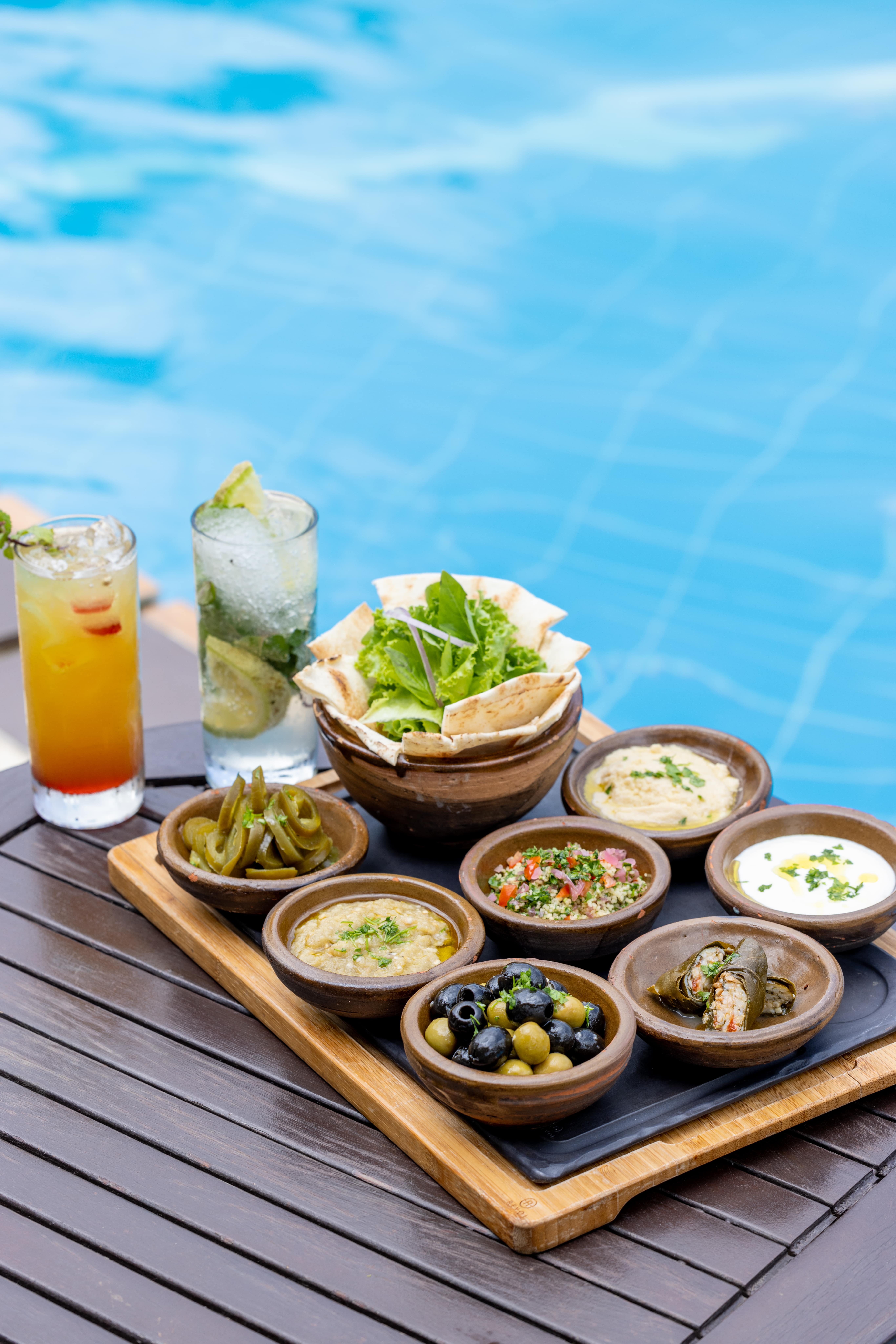 An image of the variety of condiments being served at The NSU Bar at The Royal Senchi Hotel & Resort in Ghana