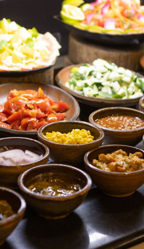 A close up image of the condiments available at the buffet at The Senchi Restaurant in The Royal Senchi Hotel & Resort in Ghana