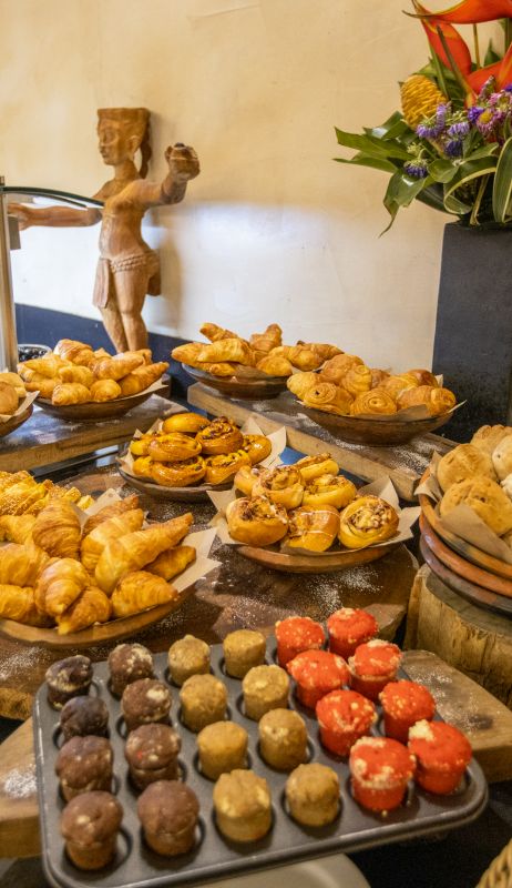 An image of the variety of fresh baked food and desserts being served at the buffet at The Senchi Restaurant in The Royal Senchi Hotel & Resort in Ghana