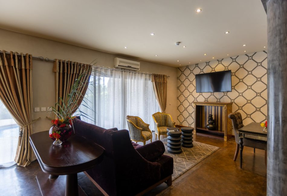 View of the lounge in The Picathartes Presidential Suite at The Royal Senchi Hotel & Resort, Ghana