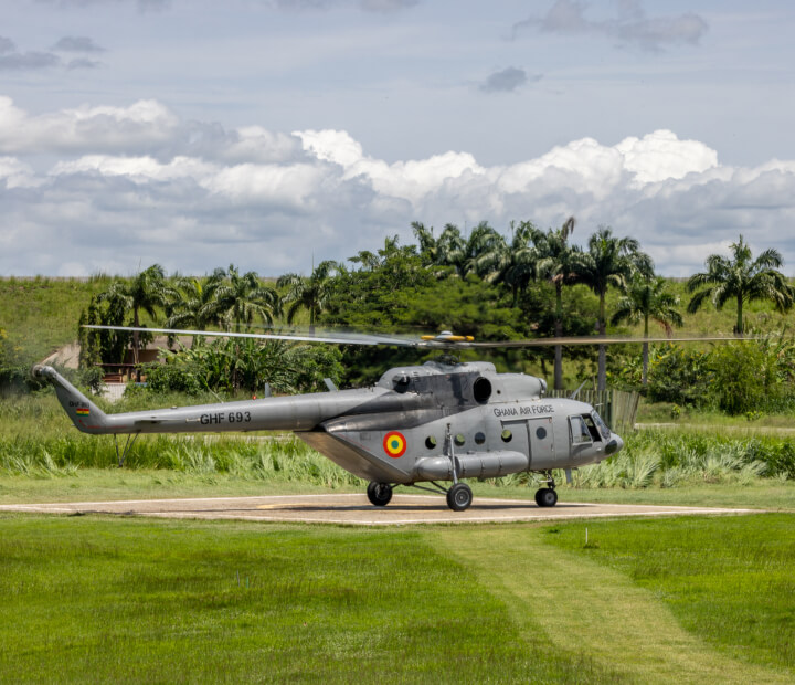 Photo of a helicopter parked at the helipad at The Royal Senchi Hotel & Resort in Ghana