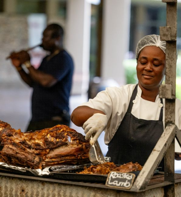 An image of one of the chefs in charge of the barbeque during our dining service at The Royal Senchi Hotel & Resort in Ghana