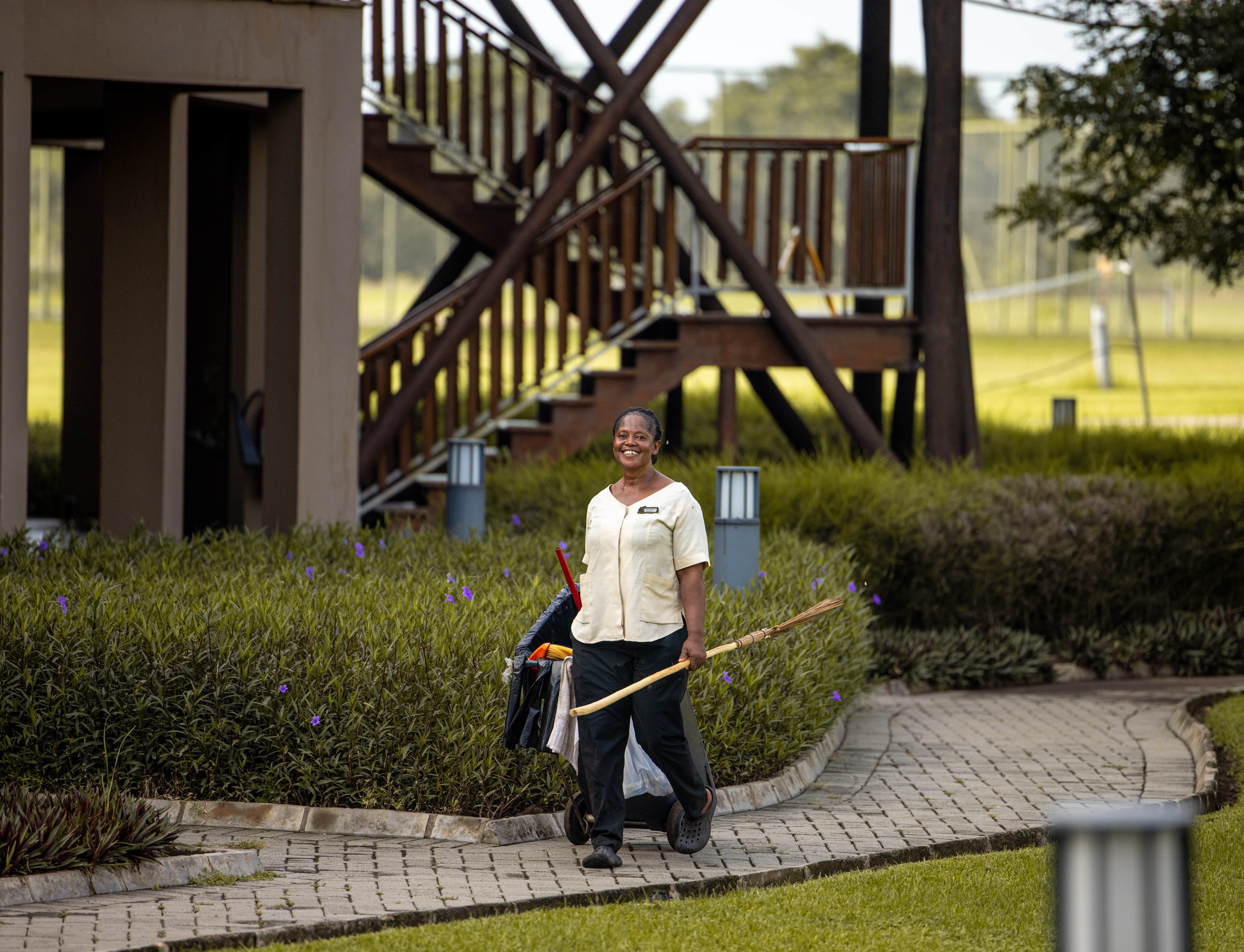 A staff member in charge of our housekeeping at The Royal Senchi Hotel & Resort in Ghana