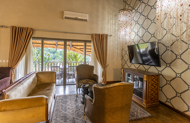 View of the lounge in The Picathartes Presidential Suite at The Royal Senchi Hotel & Resort, Ghana